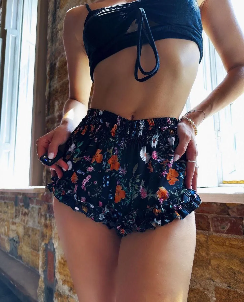 Black floral twerk shorts with ruffles