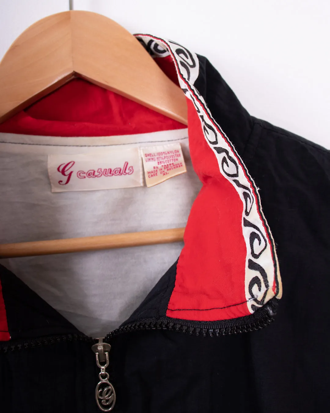 G Casuals Black and Red Swirl Pattern Windbreaker